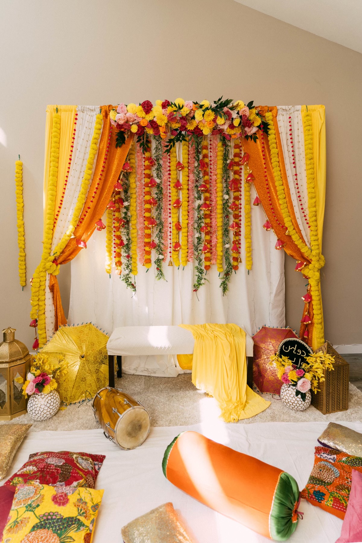 Marigold & rose draped backdrop