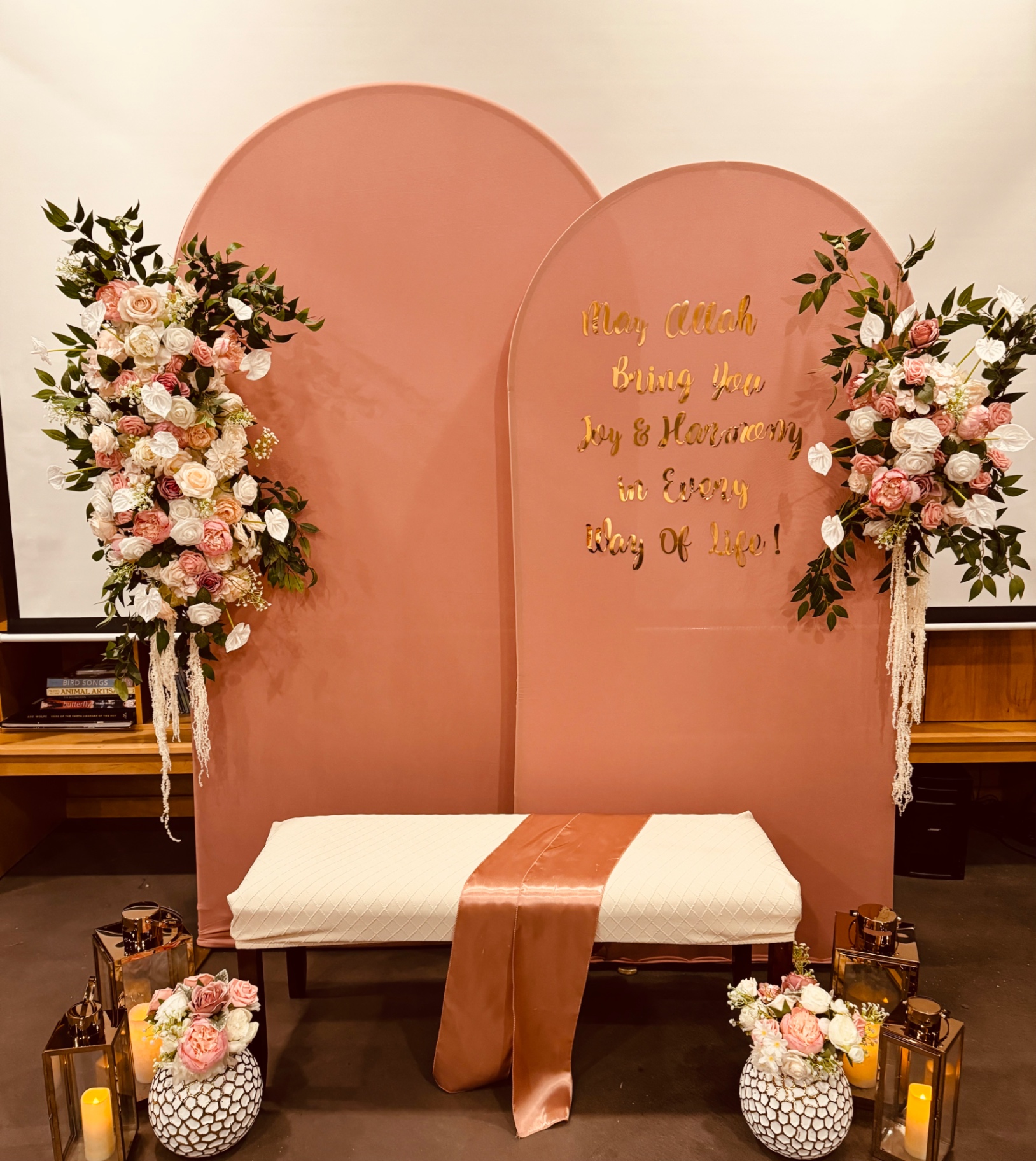 Blush arches with gold script