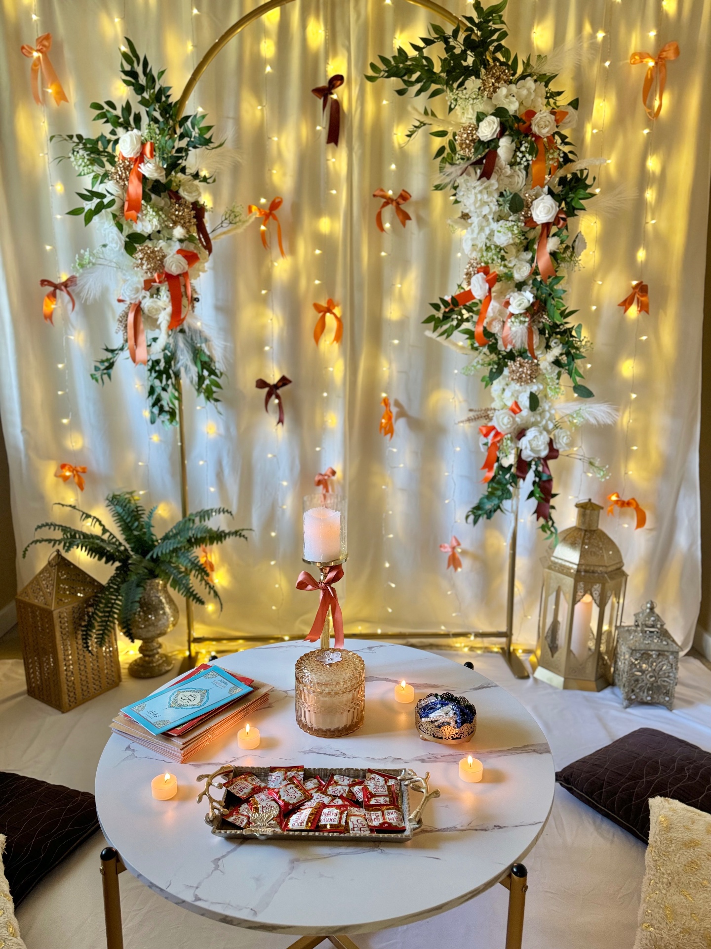 Gold hoop with orange bows & fairy lights