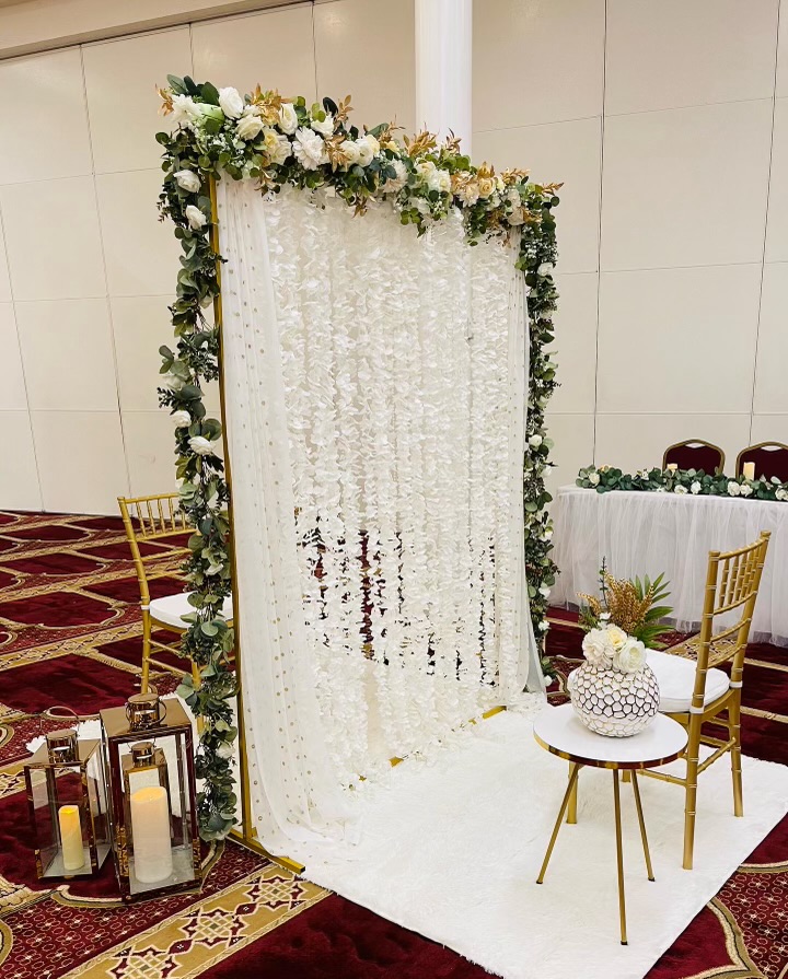 Ivory cascading floral arch